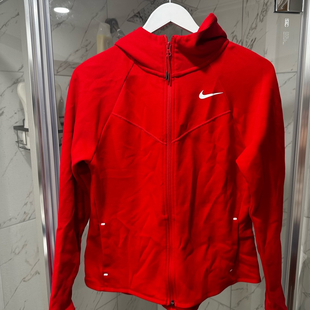 Lightly used University red Nike dry fit jacket